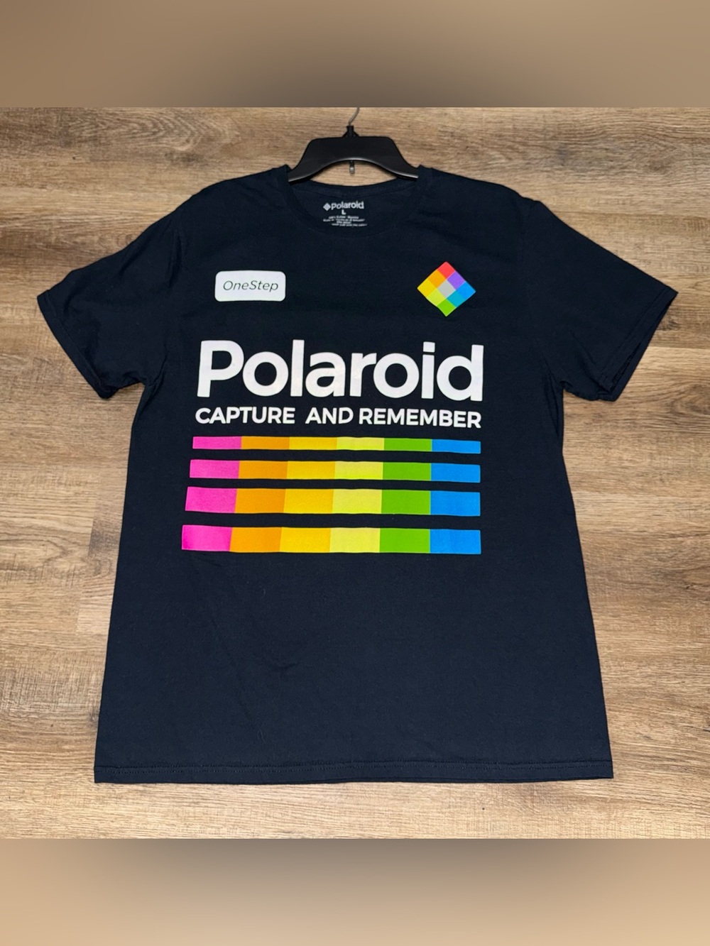 Polaroid Black T-Shirt with Multicolor Stripe Logo. Size Large.